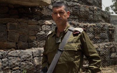 Head of the IDF's 210th 'Bashan' Division Brig. Gen. Amit Fisher praises his unit's actions during fierce clashes with Iranian and Syrian forces along the Syrian border on May 10, 2018. (Screen capture: Israel Defense Forces)
