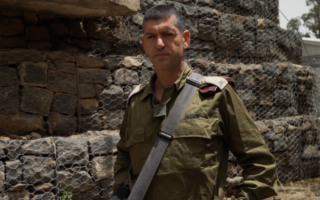 Head of the IDF's 210th 'Bashan' Division Brig. Gen. Amit Fisher praises his unit's actions during fierce clashes with Iranian and Syrian forces along the Syrian border on May 10, 2018. (Screen capture: Israel Defense Forces) Head of the IDF's 210th 'Bashan' Division Brig. Gen. Amit Fisher praises his unit's actions during fierce clashes with Iranian and Syrian forces along the Syrian border on May 10, 2018. (Screen capture: Israel Defense Forces)