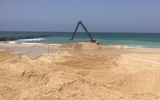 Construction equipment working on an undersea barrier near Israels border with the Gaza Strip. (Defense Ministry)