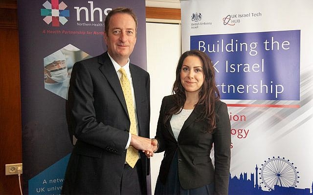British Ambassador to Israel, David Quarrey, left, and Head of Corporate Affairs for the NHSA Suzanne Ali-Hassan sign the MOU during MIXiii Biomed 2018 in Tel Aviv; May 16, 2018 ( MIXiii Biomed 2018) British Ambassador to Israel, David Quarrey, left, and Head of Corporate Affairs for the NHSA Suzanne Ali-Hassan sign the MOU during MIXiii Biomed 2018 in Tel Aviv; May 16, 2018 ( MIXiii Biomed 2018)