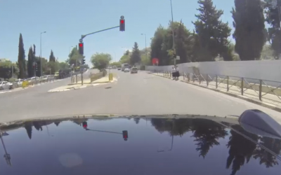 A Mobileye self-driving car running a red light in Jerusalem in May 2018. (Screen capture: Channel 10)