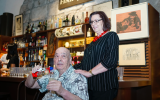 Mouli and Edna Azrieli, the owners of Fink's, a legendary Jerusalem bar, now part of the 'London in Jerusalem' exhibit at the Tower of David Museum, open until December 2018. (Courtesy, Oded Antman)