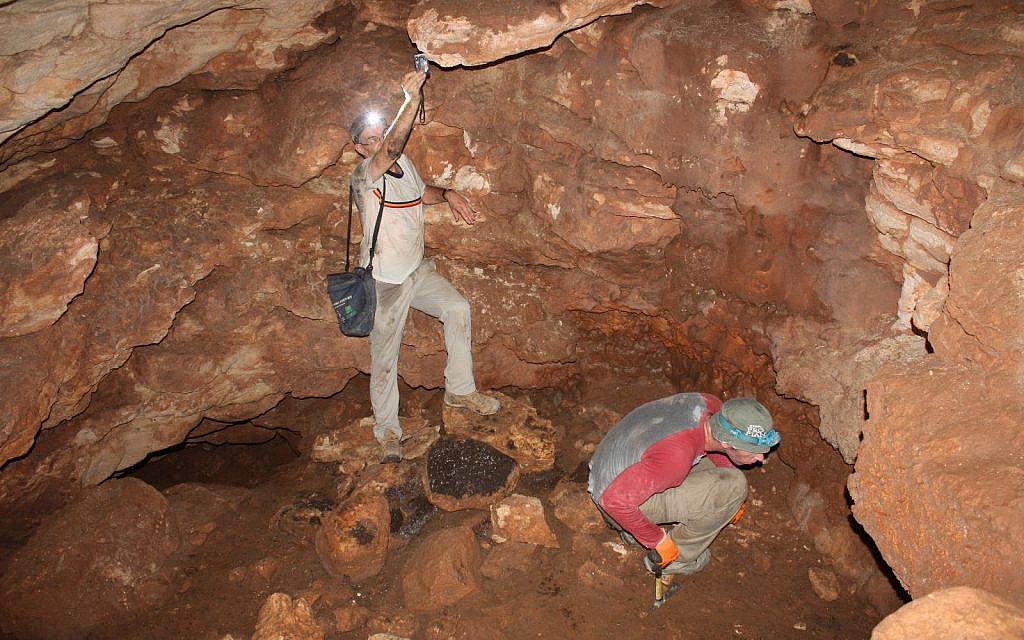 Archaeologists excavate a limestone cave near Modi'in, April 2018. (COGAT spokesman)