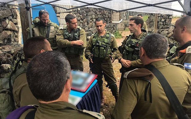 IDF chief Gadi Eisenkot (brown beret) meets with senior officers from the Northern Command amid concerns of potential Iranian missile strike against northern Israel on May 9, 2018. (Israel Defense Forces)
