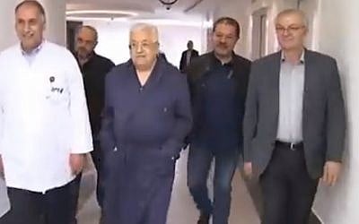 Palestinian Authority President Mahmoud Abbas walking in hospital on May 21, 2018. (Screen capture/Twitter) Palestinian Authority President Mahmoud Abbas walking in hospital on May 21, 2018. (Screen capture/Twitter)