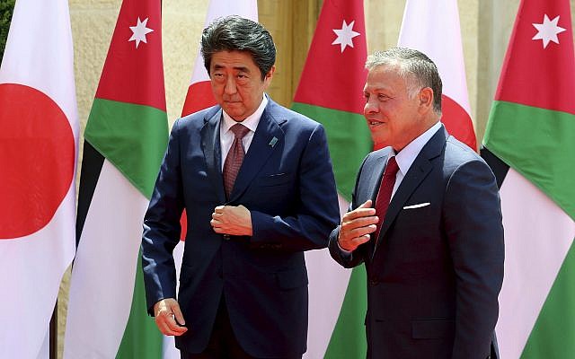 Japanese Prime Minister Shinzo Abe, left, is welcomed by King Abdullah II of Jordan at the Husseiniya palace in Amman, Jordan, May 1, 2018. (AP Photo/Raad Adayleh) Japanese Prime Minister Shinzo Abe, left, is welcomed by King Abdullah II of Jordan at the Husseiniya palace in Amman, Jordan, May 1, 2018. (AP Photo/Raad Adayleh)
