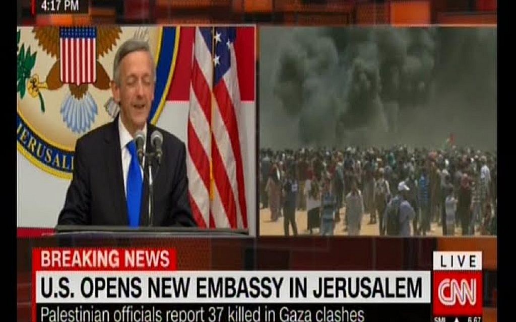 CNN shows the US embassy opening in Jerusalem on a split screen with violence on the Gaza border, May 14, 2018 (Screenshot) CNN shows the US embassy opening in Jerusalem on a split screen with violence on the Gaza border, May 14, 2018 (Screenshot)
