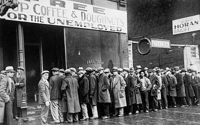 Unemployed men queued outside a Depression-era soup kitchen opened in Chicago by the mobster Al Capone in 1931. Economic uncertainty fueled Americans’ anxieties about taking in large numbers of refugees from Europe. (National Archives at College Park-Still Pictures via JTA)