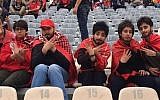 Female soccer fans in Iran who dressed up as men to sneak into a men-only soccer game in Tehran on April 27, 2018. (screen capture: YouTube)