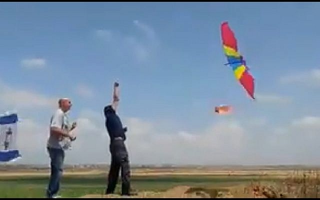 Israelis try to launch a burning kite over the border to Gaza, May 11, 2018. (Screen capture: Twitter) Israelis try to launch a burning kite over the border to Gaza, May 11, 2018. (Screen capture: Twitter)