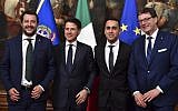 (From L) Italys Newly appointed Prime Minister Giuseppe Conte, Italys Interior Minister and deputy Prime Minister Matteo Salvini, Italys Labor and Industry Minister and deputy PM Luigi Di Maio and Italys Undersecretary for Prime Minister Giancarlo Giorgetti pose for a photograph after the bell ceremony, signifying the start of the first cabinet meeting, at Chigi Palace in Rome on June 1, 2018. (AFP PHOTO / Andreas SOLARO)