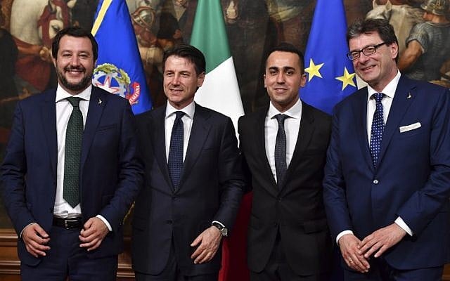 (From L) Italys Newly appointed Prime Minister Giuseppe Conte, Italys Interior Minister and deputy Prime Minister Matteo Salvini, Italys Labor and Industry Minister and deputy PM Luigi Di Maio and Italys Undersecretary for Prime Minister Giancarlo Giorgetti pose for a photograph after the bell ceremony, signifying the start of the first cabinet meeting, at Chigi Palace in Rome on June 1, 2018. (AFP PHOTO / Andreas SOLARO) (From L) Italys Newly appointed Prime Minister Giuseppe Conte, Italys Interior Minister and deputy Prime Minister Matteo Salvini, Italys Labor and Industry Minister and deputy PM Luigi Di Maio and Italys Undersecretary for Prime Minister Giancarlo Giorgetti pose for a photograph after the bell ceremony, signifying the start of the first cabinet meeting, at Chigi Palace in Rome on June 1, 2018. (AFP PHOTO / Andreas SOLARO)