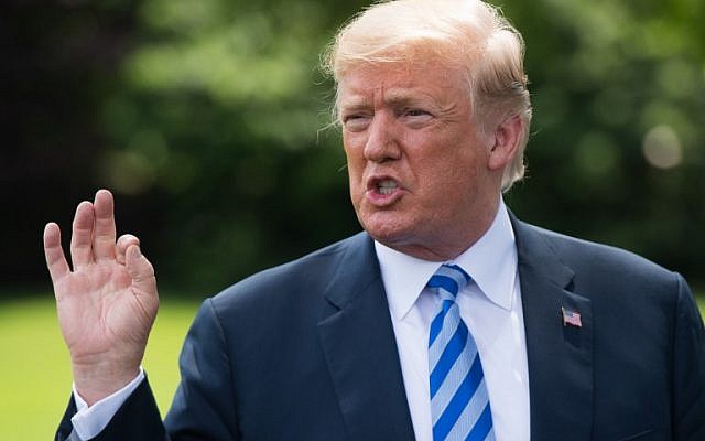 US President Donald Trump speaks following a meeting on the South Lawn of the White House in Washington, DC June 1, 2018. (SAUL LOEB/AFP)