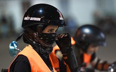 A Saudi woman, 'Noura,' preparing for a training session at the Bikers Skills Institute, a motorcycle driving school on the outskirts of Riyadh, June 3, 2018. (AFP Photo/Fayez Nureldine)