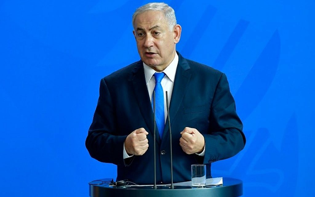 Prime Minister Benjamin Netanyahu speaks at a press conference after meeting with German Chancellor Angela Merkel at the Chancellery in Berlin on June 4, 2018. (AFP Photo/Tobias Schwarz) Prime Minister Benjamin Netanyahu speaks at a press conference after meeting with German Chancellor Angela Merkel at the Chancellery in Berlin on June 4, 2018. (AFP Photo/Tobias Schwarz)