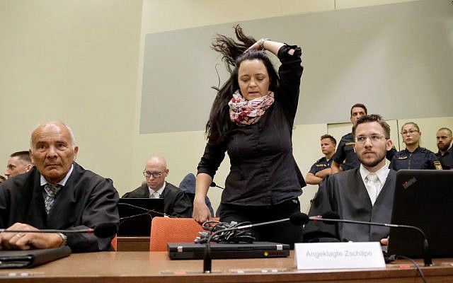 Defendant Beate Zschaepe arrives for the continuation of her trial at a courtroom in Munich, southern Germany on June 5, 2018. (Matthias Schrader/AFP/POOL) Defendant Beate Zschaepe arrives for the continuation of her trial at a courtroom in Munich, southern Germany on June 5, 2018. (Matthias Schrader/AFP/POOL)