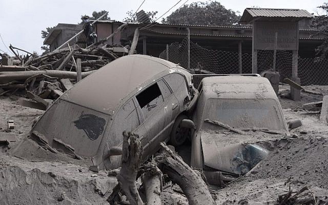 View of the damage casued by the eruption of the Fuego Volcano in village of San Miguel Los Lotes, in Escuintla Department, about 35 km southwest of Guatemala City, taken on June 5, 2018. (AFP PHOTO / Johan ORDONEZ View of the damage casued by the eruption of the Fuego Volcano in village of San Miguel Los Lotes, in Escuintla Department, about 35 km southwest of Guatemala City, taken on June 5, 2018. (AFP PHOTO / Johan ORDONEZ
