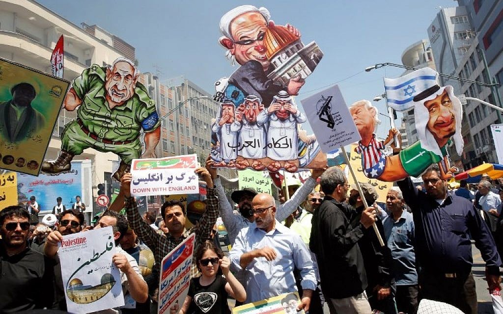 Iranians take part in a a rally in Tehran to mark Jerusalem Day on June 8, 2018. (AFP Photo/STR