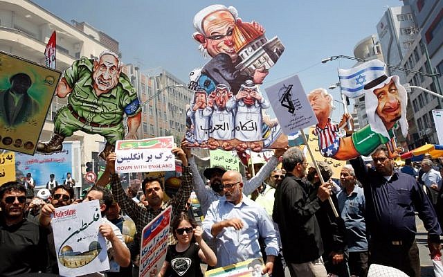 Iranians take part in a a rally in Tehran to mark Jerusalem Day on June 8, 2018. (AFP Photo/STR