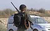 A soldier at the southern Israeli kibbutz of Nahal Oz near the border with the Gaza Strip on June 8, 2018. (AFP PHOTO / JACK GUEZ)