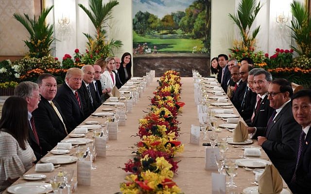 US President Donald Trump, fourth left, and his delegation share a working lunch Singapore's Prime Minister Lee Hsien Loong and his team during the US leader's visit to The Istana, the official residence of the prime minister, in Singapore on June 11, 2018. (AFP PHOTO / SAUL LOEB) US President Donald Trump, fourth left, and his delegation share a working lunch Singapore's Prime Minister Lee Hsien Loong and his team during the US leader's visit to The Istana, the official residence of the prime minister, in Singapore on June 11, 2018. (AFP PHOTO / SAUL LOEB)