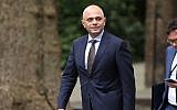 Britain's Home Secretary Sajid Javid walks along Downing Street in central London on June 12, 2018. (AFP/Daniel Leal-Olivas)