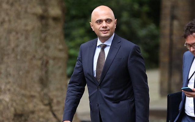 Britain's Home Secretary Sajid Javid walks along Downing Street in central London on June 12, 2018. (AFP/Daniel Leal-Olivas) Britain's Home Secretary Sajid Javid walks along Downing Street in central London on June 12, 2018. (AFP/Daniel Leal-Olivas)