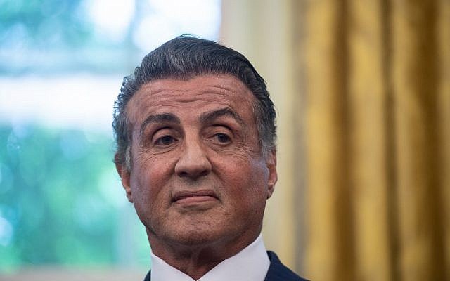 In this file photo taken on May 24, 2018, US actor Sylvester Stallone looks on before the US president signed a posthumous pardon for former world champion boxer Jack Johnson in the Oval Office at the White House in Washington, DC. (AFP PHOTO / NICHOLAS KAMM) In this file photo taken on May 24, 2018, US actor Sylvester Stallone looks on before the US president signed a posthumous pardon for former world champion boxer Jack Johnson in the Oval Office at the White House in Washington, DC. (AFP PHOTO / NICHOLAS KAMM)