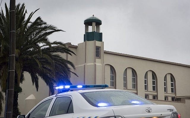 A police vehicle stands in front of the mosque following a stabbing attack that left two worshipers dead and the attacker shot by the police on June 14, 2018 in Malmesbury, north of Cape Town (AFP PHOTO / RODGER BOSCH) A police vehicle stands in front of the mosque following a stabbing attack that left two worshipers dead and the attacker shot by the police on June 14, 2018 in Malmesbury, north of Cape Town (AFP PHOTO / RODGER BOSCH)