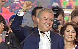 Newly elected Colombian president Ivan Duque celebrates with supporters in Bogota, after winning the presidential runoff election on June 17, 2018. (AFP/ Raul Arboleda)