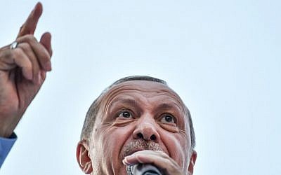 Turkish President Recep Tayyip Erdogan speaks during a rally at the Gaziosmanpasa district of Istanbul, on June 22, 2018. (AFP Photo/Bulent Kilic)