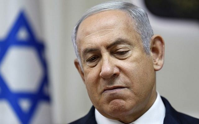 Prime Minister Benjamin Netanyahu attends the weekly cabinet meeting at his office in Jerusalem on June 24, 2018. (AFP Photo/Gali Tibbon) Prime Minister Benjamin Netanyahu attends the weekly cabinet meeting at his office in Jerusalem on June 24, 2018. (AFP Photo/Gali Tibbon)