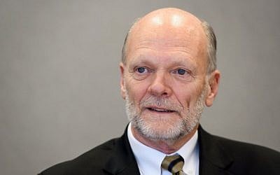 In this file photo taken on March 19, 2018 US candidate to the head of International Organization for Migration (IOM) Ken Isaacs looks on during a press briefing in Geneva. (AFP/Fabrice Coffrini)