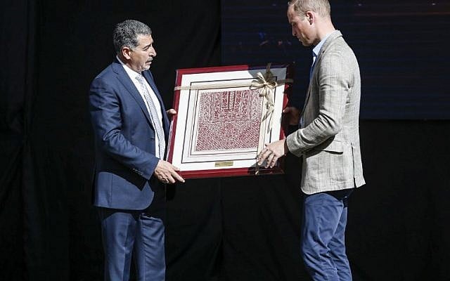 Britain's Prince William receives a gift from Musa Hadid, the mayor of Ramallah, at a reception during his visit to the West Bank city's municipality on June 27, 2018. (AFP PHOTO / POOL / ABBAS MOMANI) Britain's Prince William receives a gift from Musa Hadid, the mayor of Ramallah, at a reception during his visit to the West Bank city's municipality on June 27, 2018. (AFP PHOTO / POOL / ABBAS MOMANI)