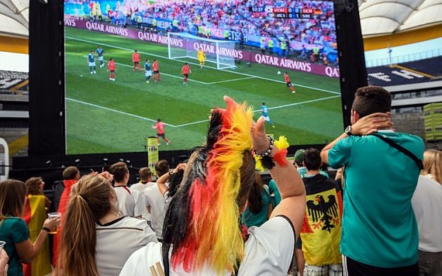 Supporters of the German national football team react as they attend a public viewing event at the Commerzbank Arena stadium in Frankfurt am Main, western Germany, to watch the Russia 2018 World Cup Group F football match between South Korea and Germany on June 27, 2018. (AFP PHOTO / dpa / Andreas Arnold) Supporters of the German national football team react as they attend a public viewing event at the Commerzbank Arena stadium in Frankfurt am Main, western Germany, to watch the Russia 2018 World Cup Group F football match between South Korea and Germany on June 27, 2018. (AFP PHOTO / dpa / Andreas Arnold)