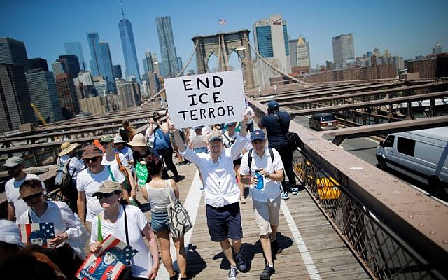 Demonstrators cross the Brooklyn Bridge during a march against the separation of families caught illegally crossing the US-Mexico border, on June 30, 2018 in New York. (AFP Photo/Eduardo Munoz Alvarez) Demonstrators cross the Brooklyn Bridge during a march against the separation of families caught illegally crossing the US-Mexico border, on June 30, 2018 in New York. (AFP Photo/Eduardo Munoz Alvarez)