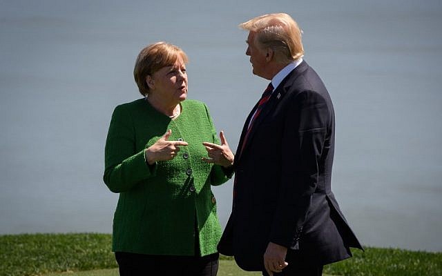 Germany's Chancellor Angela Merkel, left, and US President Donald Trump on the first day of the G7 Summit, in La Malbaie, Canada, on June 8, 2018. (Leon Neal/Getty Images/AFP) Germany's Chancellor Angela Merkel, left, and US President Donald Trump on the first day of the G7 Summit, in La Malbaie, Canada, on June 8, 2018. (Leon Neal/Getty Images/AFP)