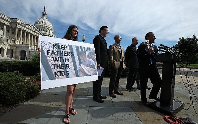 Rep. Luis Gutierrez holds up a picture of his daughter and grandson during a news conference to urge the Trump administration into ending its policy of separating families at the US- Mexico border on Capitol Hill June 14, 2018 in Washington, DC. (Mark Wilson/Getty Images/AFP) Rep. Luis Gutierrez holds up a picture of his daughter and grandson during a news conference to urge the Trump administration into ending its policy of separating families at the US- Mexico border on Capitol Hill June 14, 2018 in Washington, DC. (Mark Wilson/Getty Images/AFP)