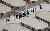 Children and workers are seen at a tent encampment recently built near the Tornillo Port of Entry on June 19, 2018 in Tornillo, Texas. (Joe Raedle/Getty Images/AFP)