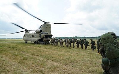 Israeli paratroopers board a helicopter as part of the US-led Swift Response exercise in Europe in June 2018. (Israel Defense Forces)