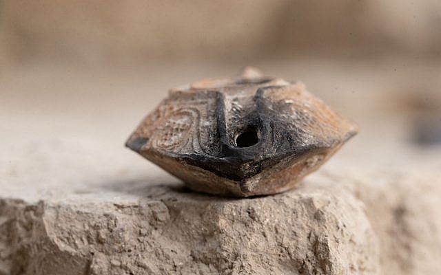 Pottery sherds uncovered in June 2018 at the Givati Parking Lot site in the City of David, include a complete lamp, dating back to the Abbasid period. (Eliyahu Yanai, City of David Archives)