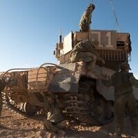 A group of female soldiers take part in a training exercise in the tank commanders' course, in an undated photograph. (Israel Defense Forces)