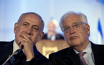 Prime Minister Benjamin Netanyahu (l), and US Ambassador to Israel David Friedman (r), attend a ceremony celebrating the 50th anniversary of Israel's reunification of Jerusalem, in front of the walls of the Old City, May 21, 2017. (Abir Sultan/Pool Photo via AP, File)