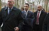 In this December 23, 2014 file photo, then-Rep. Michael Grimm, center, enters Brooklyn federal court before pleading guilty to a federal tax evasion charge in New York. Grimm doesn't want to talk about his time in prison. (AP Photo/John Minchillo, File)