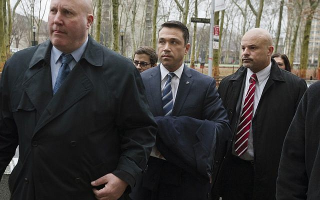 In this December 23, 2014 file photo, then-Rep. Michael Grimm, center, enters Brooklyn federal court before pleading guilty to a federal tax evasion charge in New York. Grimm doesn't want to talk about his time in prison. (AP Photo/John Minchillo, File) In this December 23, 2014 file photo, then-Rep. Michael Grimm, center, enters Brooklyn federal court before pleading guilty to a federal tax evasion charge in New York. Grimm doesn't want to talk about his time in prison. (AP Photo/John Minchillo, File)