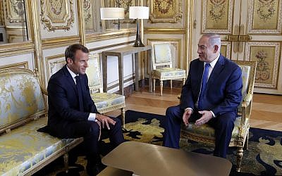 French President Emmanuel Macron, left, and Prime Minister Benjamin Netanyahu attend a meeting at the Elysee Palace, in Paris, June 5, 2018. Philippe Wojazer, pool via AP)