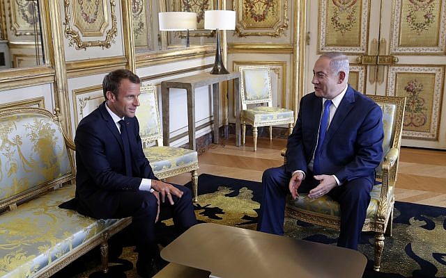 French President Emmanuel Macron, left, and Prime Minister Benjamin Netanyahu attend a meeting at the Elysee Palace, in Paris, June 5, 2018. Philippe Wojazer, pool via AP) French President Emmanuel Macron, left, and Prime Minister Benjamin Netanyahu attend a meeting at the Elysee Palace, in Paris, June 5, 2018. Philippe Wojazer, pool via AP)