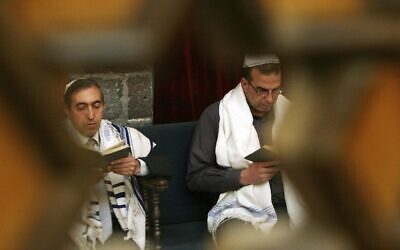 Syrian Jews celebrate Passover at the al-Franj Synagogue in downtown Damascus, Syria, April 20, 2008. (AP Photo/Bassem Tellawi, File)