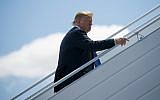 US President Donald Trump boards Air Force One for a trip to Singapore to meet with North Korean leader Kim Jong Un, at Canadian Forces Base Bagotville, in Canada, June 9, 2018. (Evan Vucci/AP)