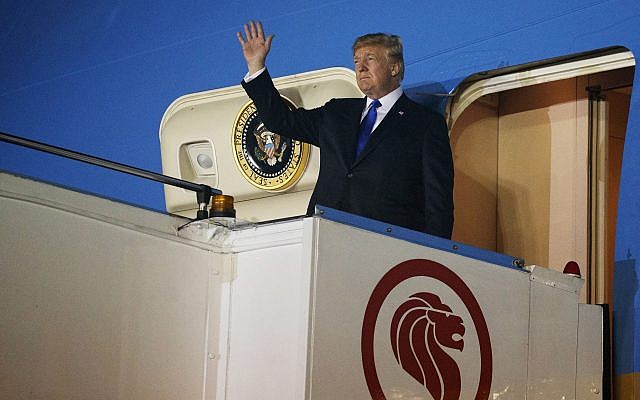 US President Donald Trump arrives at Paya Lebar Air Base for a summit with North Korea's leader Kim Jong Un, June 10, 2018, in Singapore. (AP Photo/Evan Vucci) US President Donald Trump arrives at Paya Lebar Air Base for a summit with North Korea's leader Kim Jong Un, June 10, 2018, in Singapore. (AP Photo/Evan Vucci)
